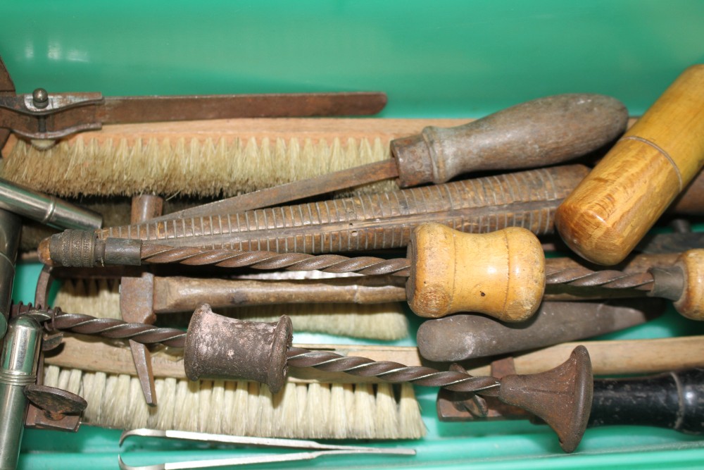 A group of assorted old and antique tools